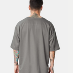 For Men’s Chrome Thorn Crest Oversized Tee – Metallic Front Graphic